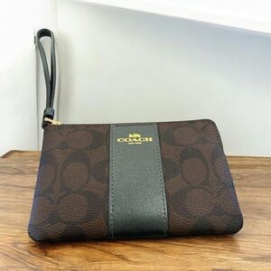 Coach signature C coated canvas wristlet w dark brown stripe Gold embossed logo